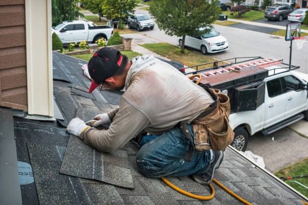 Professional Roofing technician working in Winnie, TX